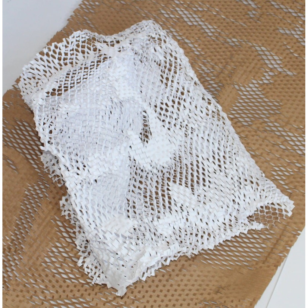 White paper cut into honeycomb for packaging 20cm x 100mb White paper cut into honeycomb for packaging 20cm x 100mb